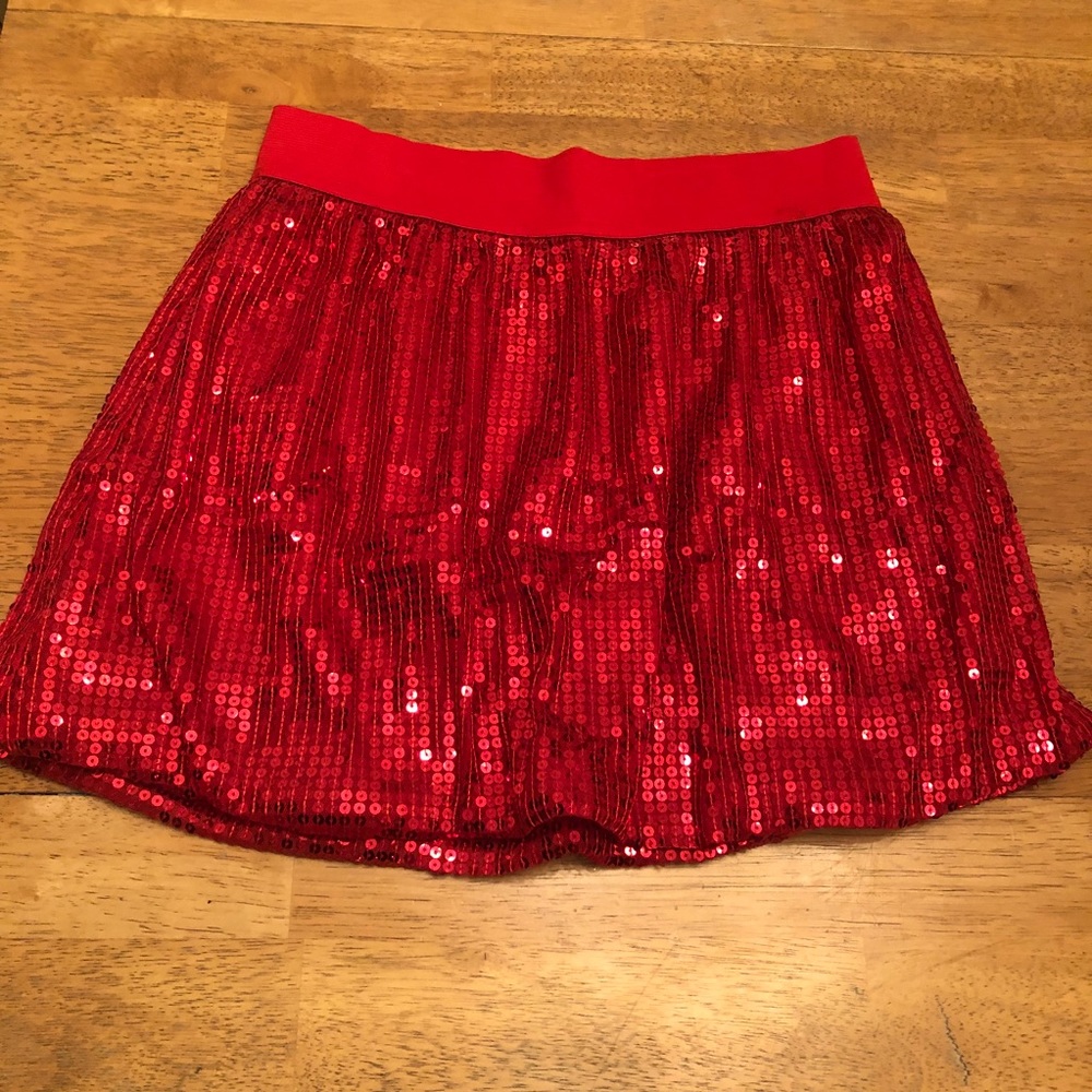 So red sequined skirt,very food condition L 14